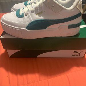 Puma women's Cali Sport Heritage Chunky Sole Sneaker in white and teal